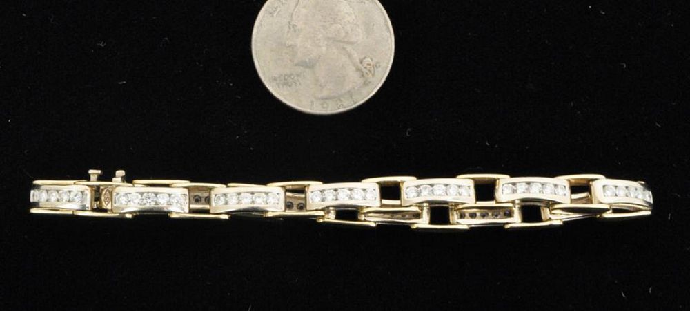 Appraisal: K Gold Diamond Link Bracelet with twelve links each having