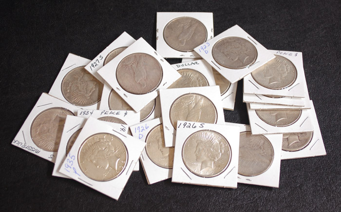 Appraisal: TWENTY-ONE U S SILVER PEACE DOLLARS -P -P -D -D