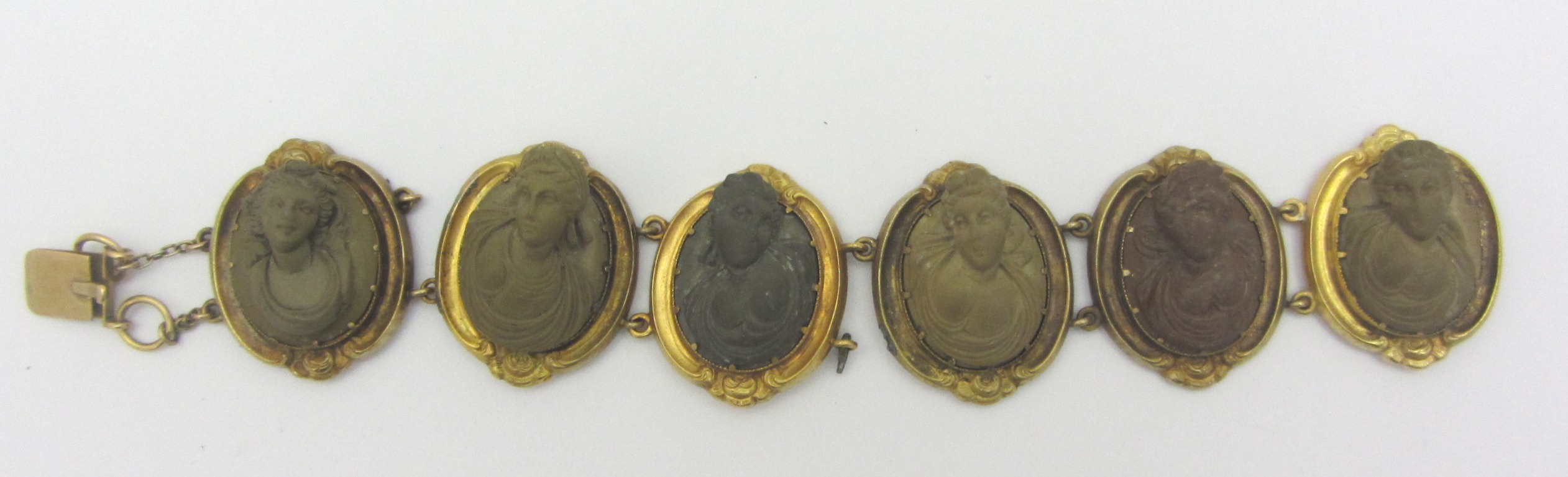 Appraisal: A gilt metal mounted lava cameo bracelet carved as a