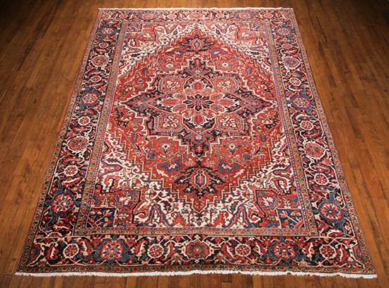 Appraisal: Heriz Rug Mid- th Century Red ground with herati field