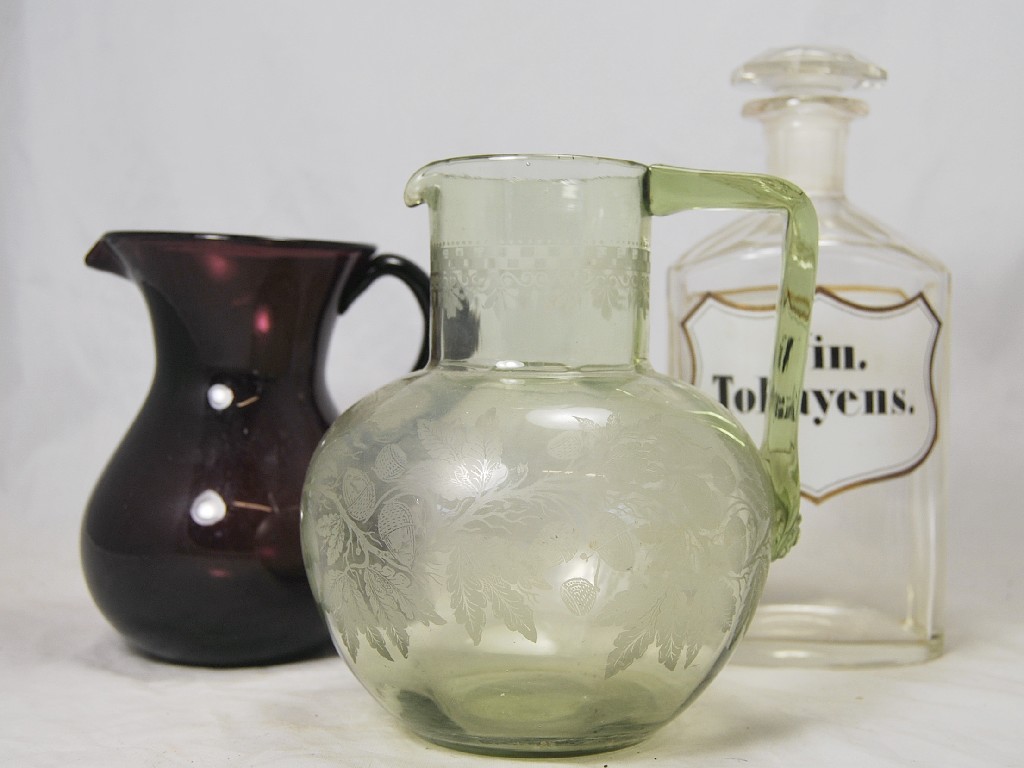 Appraisal: A th century amethyst glass water jug an etched jug