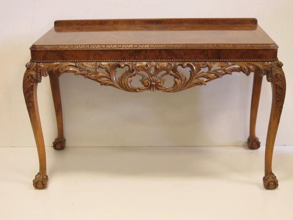 Appraisal: A Georgian style walnut Serving Table with cross-banded top above