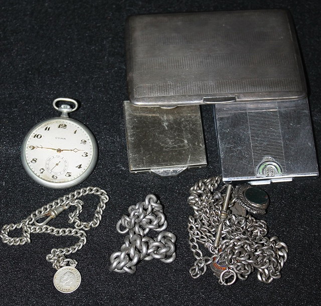 Appraisal: A SILVER CIGARETTE CASE a watch and chain and two