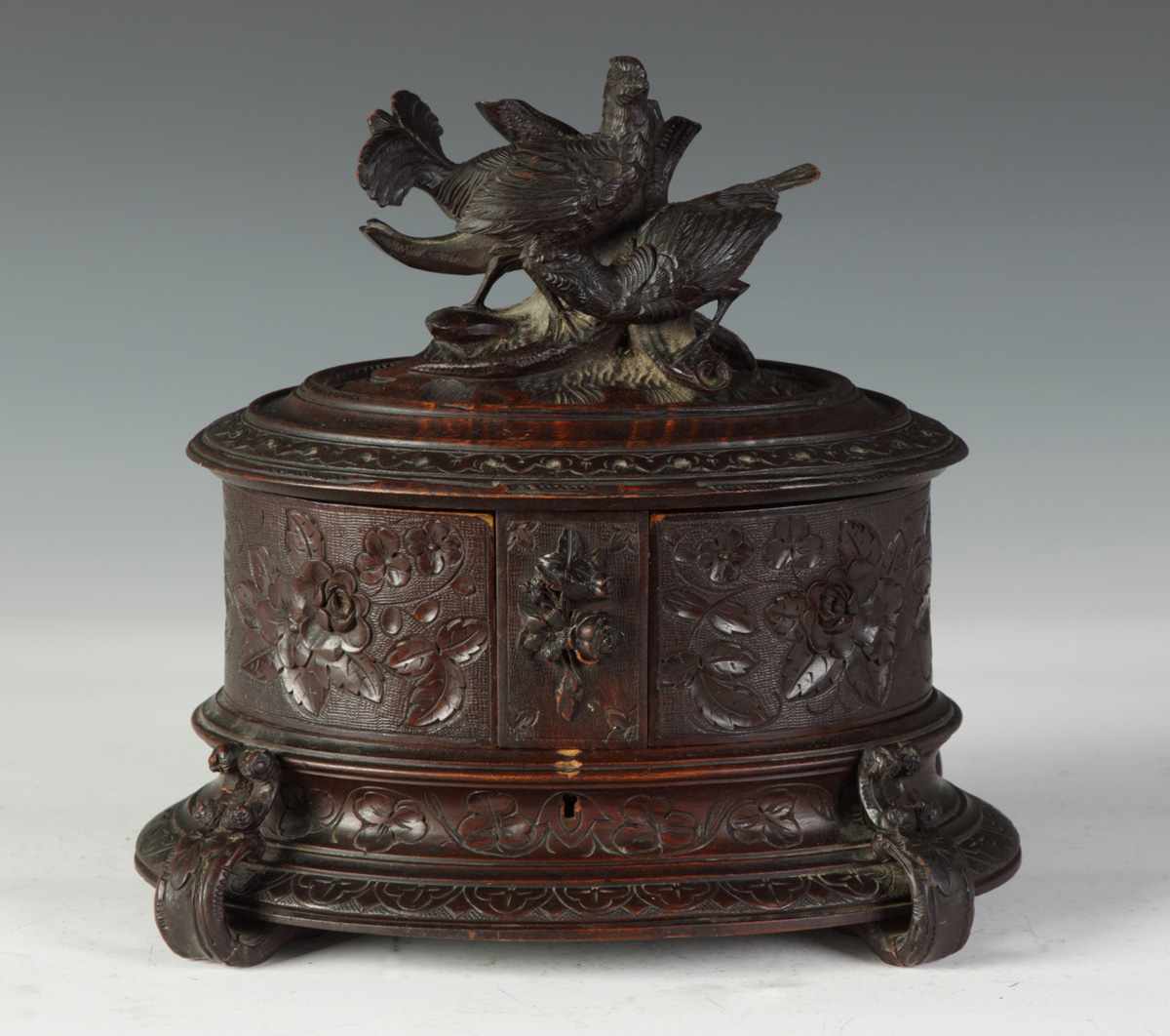 Appraisal: Carved Black Forest Jewelry Box w Birds Condition Original finish