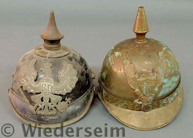 Appraisal: German WWSI leather spike helmet with inscription and metal Imperial