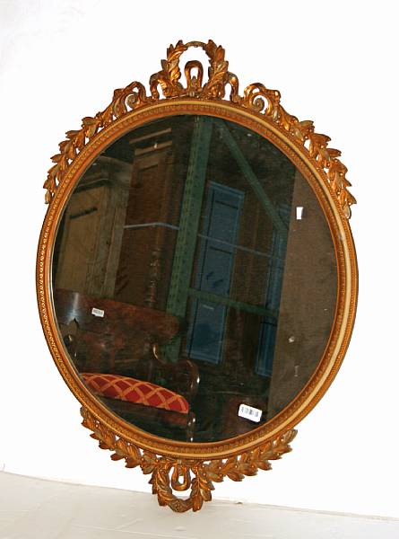 Appraisal: A Neoclassical style giltwood andf gilt composition mirror th century