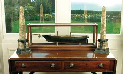 Appraisal: A wood model of the yacht America in a glazed