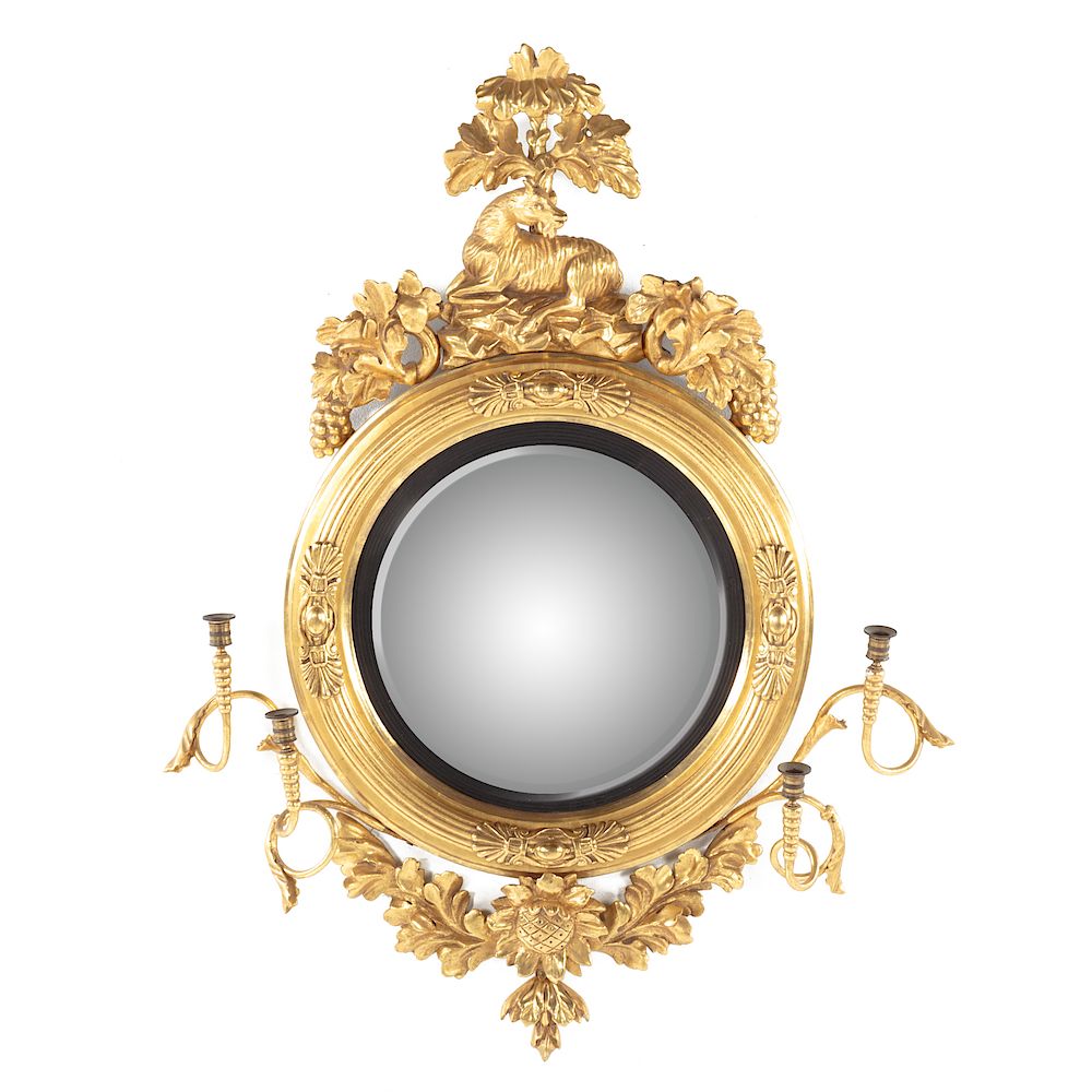 Appraisal: Regency Giltwood Convex Mirror Circa carved goat grape and leaf