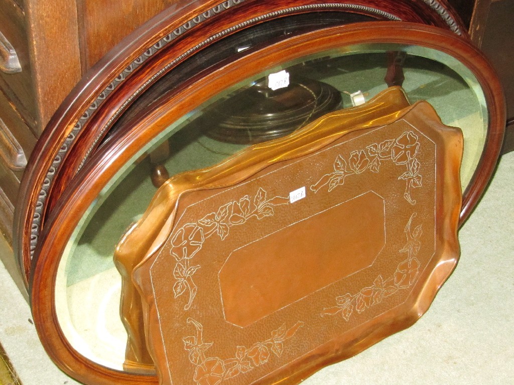 Appraisal: Lot comprising two oval wall mirrors and a copper tray