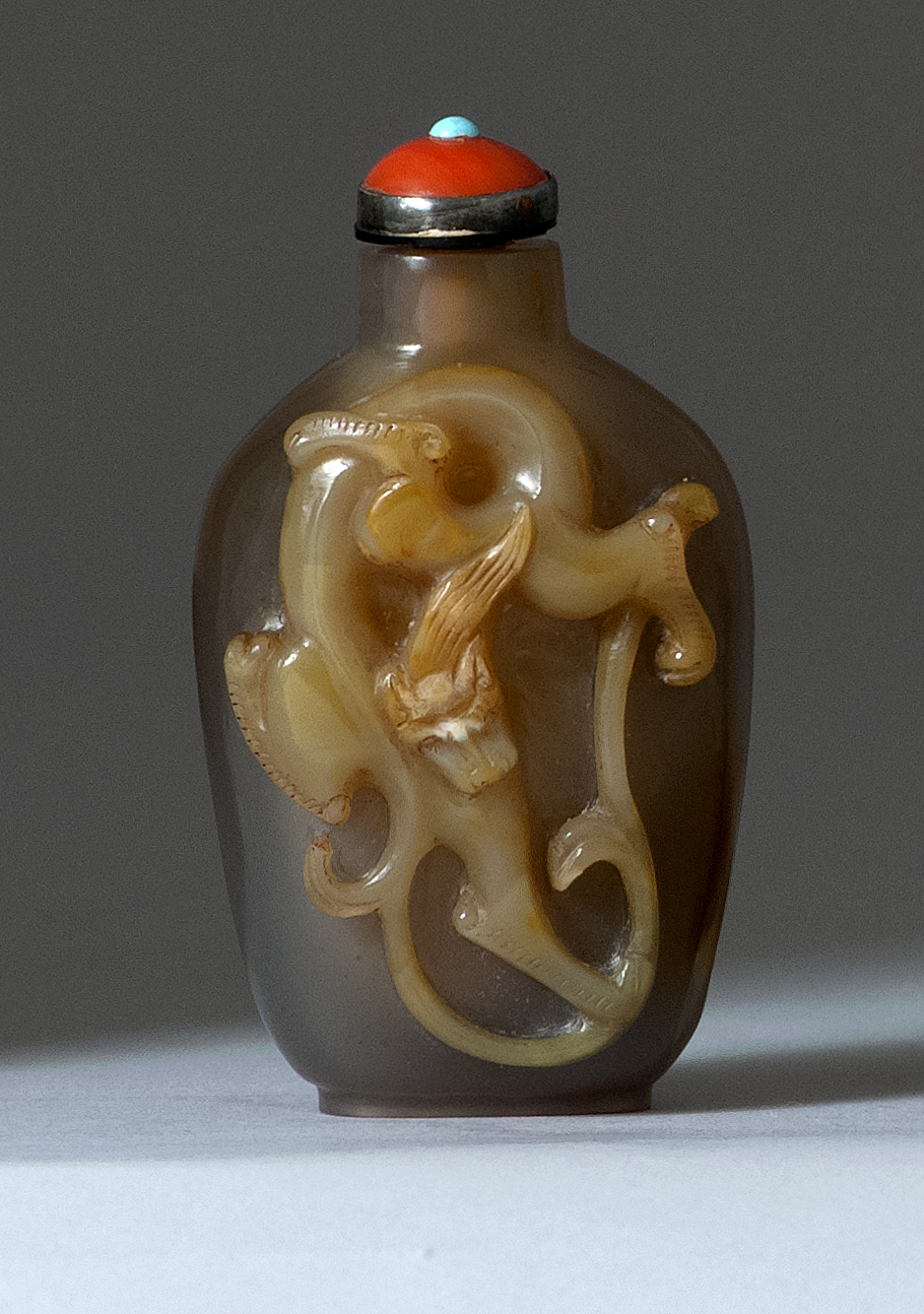 Appraisal: CAMEO AGATE SNUFF BOTTLE Circa In spade shape with relief