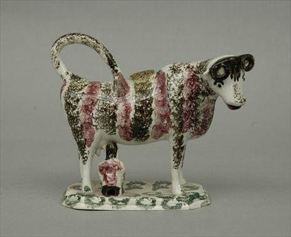 Appraisal: English Pottery Cow-Form Creamer