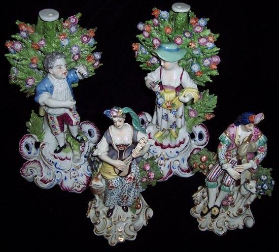 Appraisal: A pair of Derby style figures of musicians each on