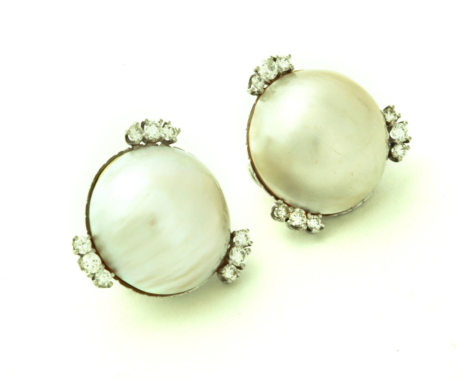 Appraisal: MABE' PEARL AND DIAMOND EARRINGS Twentieth century Large mabe' pearls