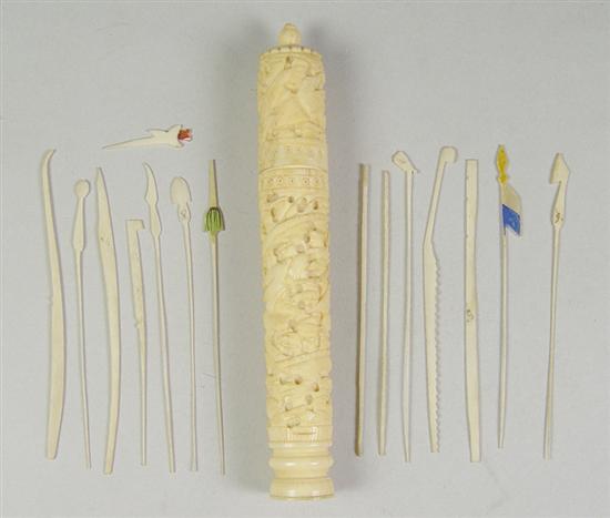 Appraisal: Carved Ivory Cylinder with Cocktail Picks Circa Carved birds and