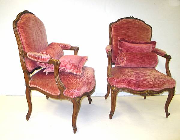 Appraisal: A pair of Louis XV style walnut fauteuils late th