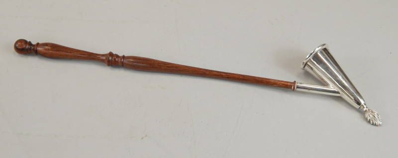 Appraisal: A modern silver mounted candle snuffer with a flame finial