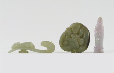 Appraisal: Three Chinese jade carvings one a belthook with a horse