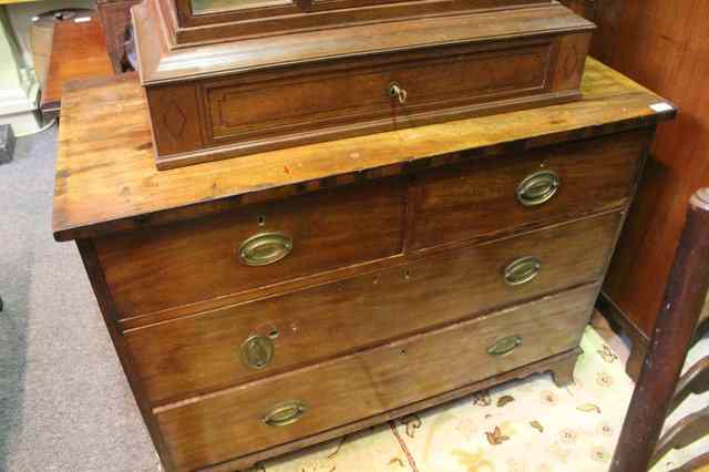 Appraisal: A TH CENTURY MAHOGANY STRAIGHT FRONT CHEST of three long