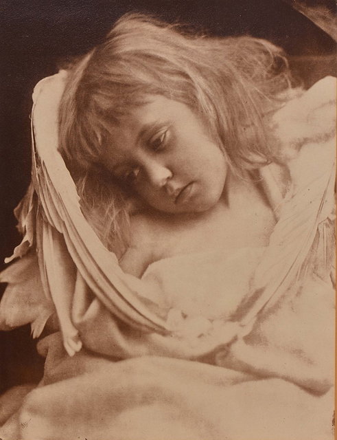 Appraisal: JULIA MARGARET CAMERON - 'Nestling Angel' carbon print x cm