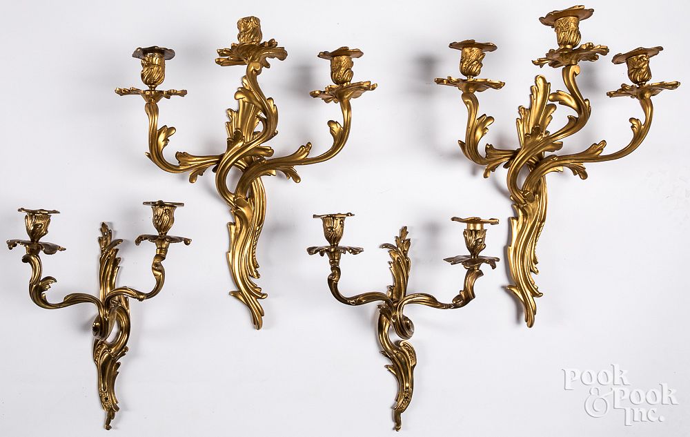 Appraisal: Two pairs of gilt brass wall candelabra Two pairs of