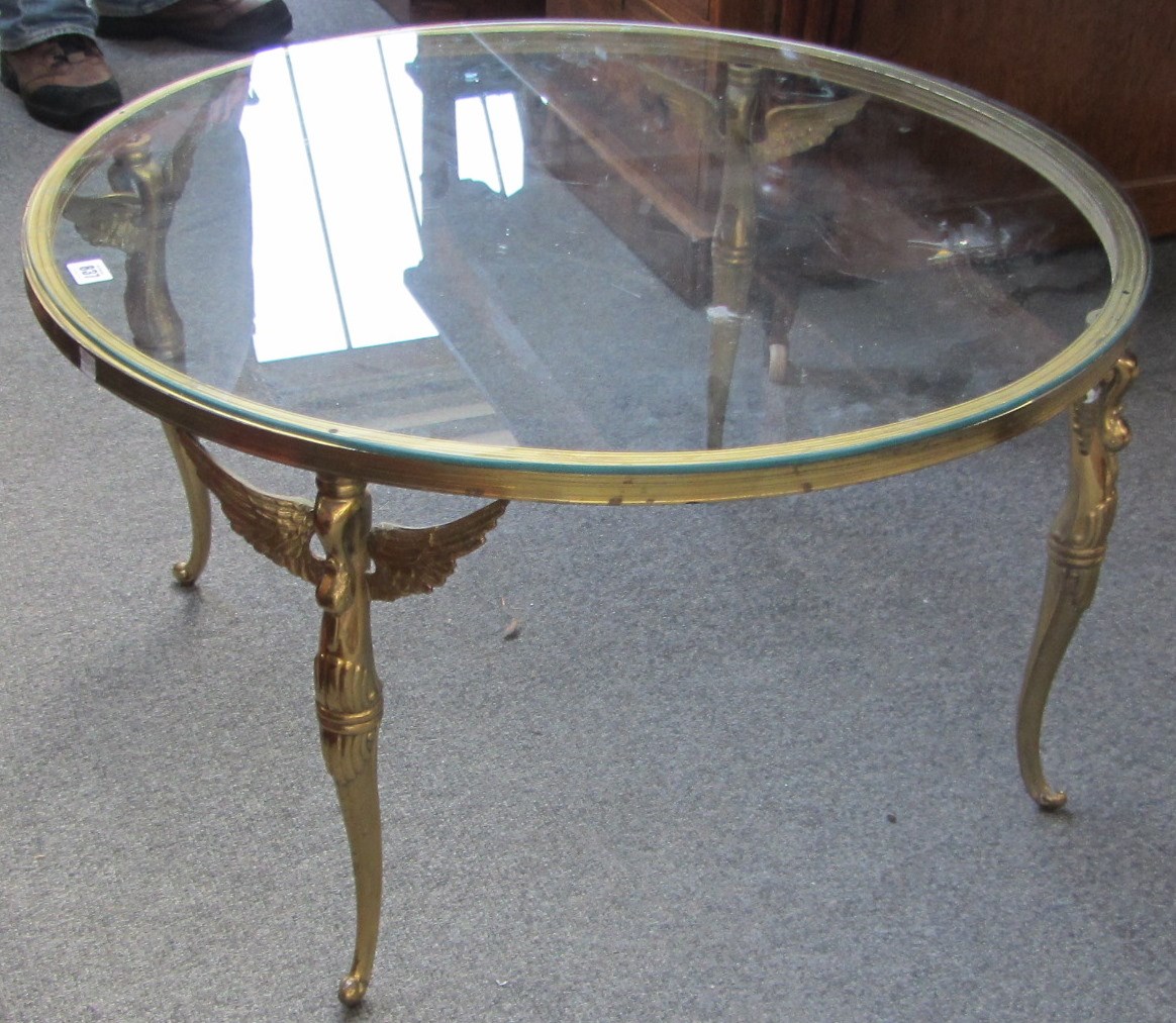 Appraisal: A th century gilt brass circular coffee table on four