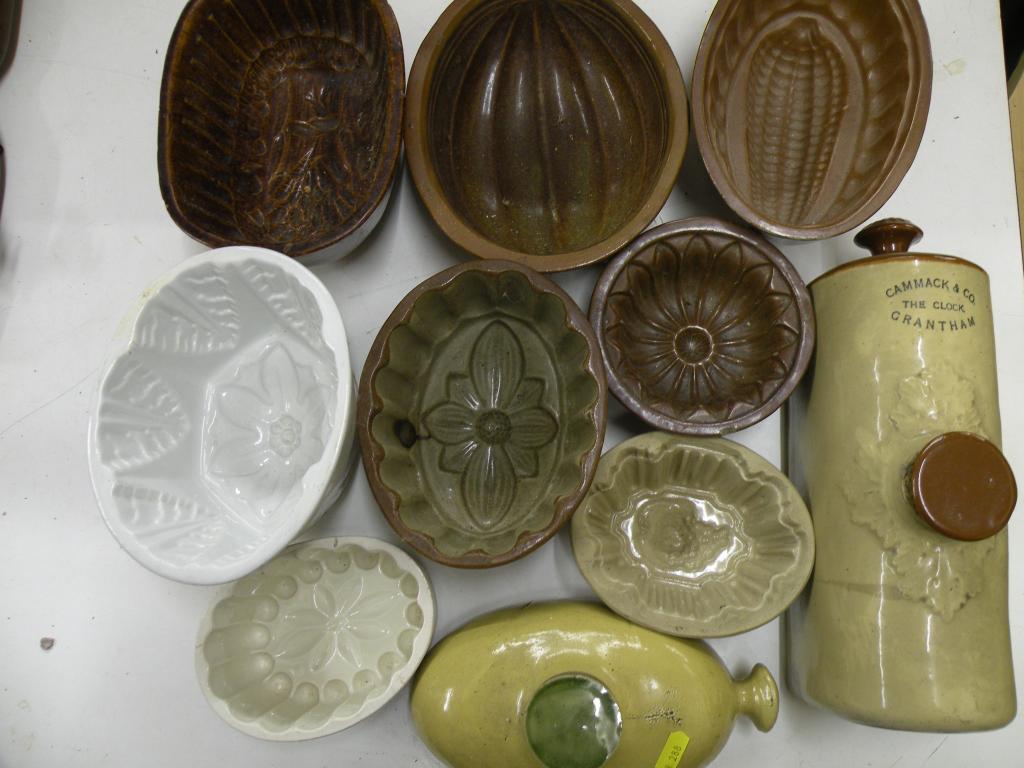 Appraisal: A quantity of thC stoneware jelly moulds other moulds and