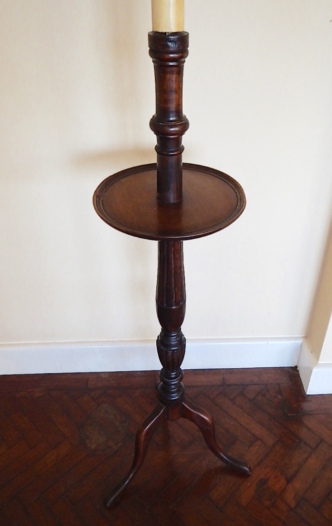 Appraisal: A Georgian style mahogany tripod standard lamp with turned column