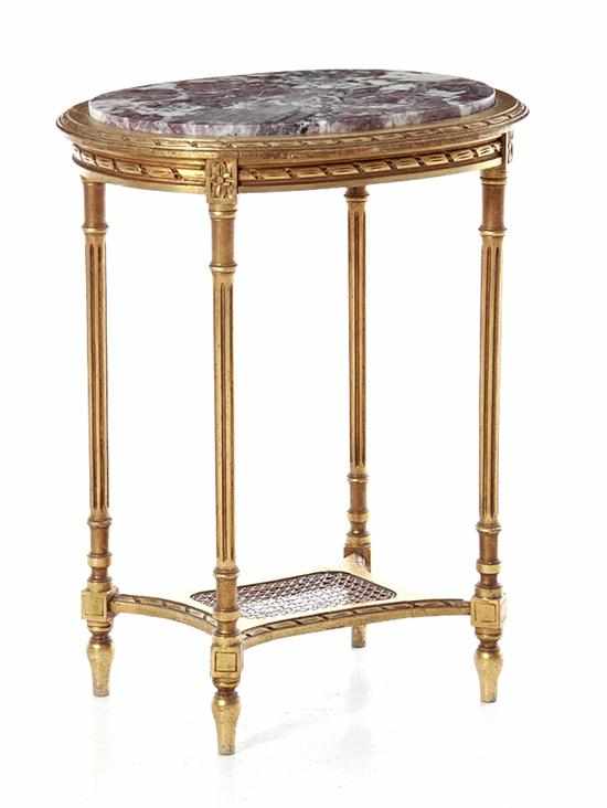 Appraisal: Louis XVI style carved giltwood marble-top table early th century