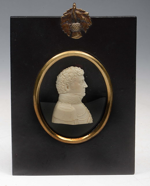 Appraisal: AN IVORY SILHOUETTE MINIATURE PORTRAIT of an Officer in naval