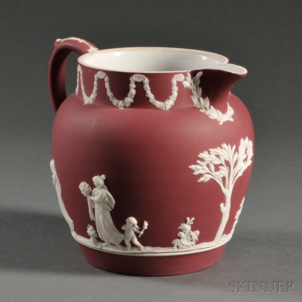 Appraisal: Wedgwood Crimson Jasper Dip Jug England c applied white classical