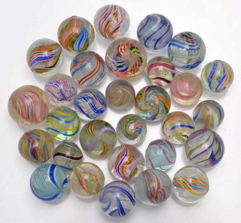 Appraisal: Lot of Swirl Marbles Description Includes white and yellow latticino