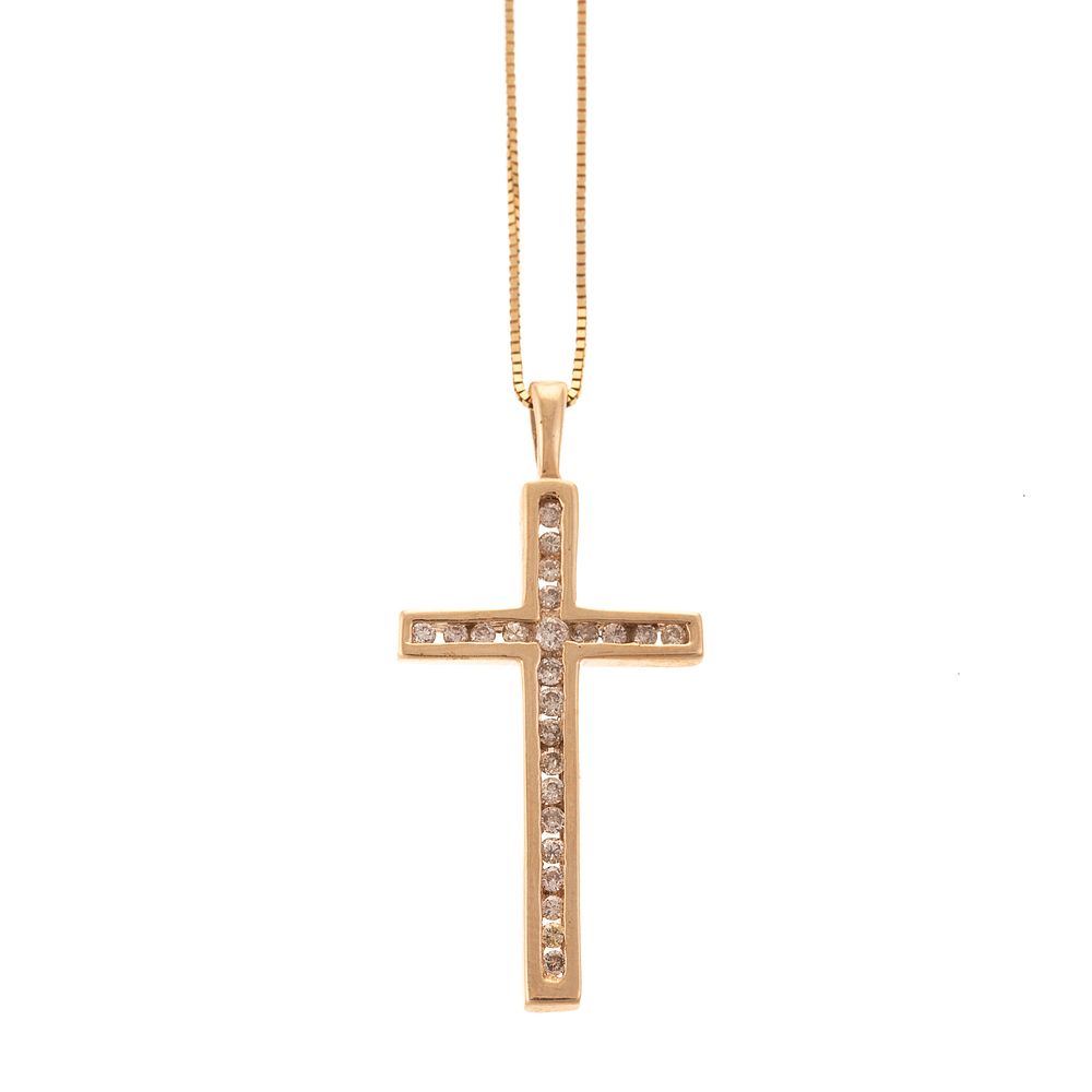 Appraisal: A Diamond Cross Pendant in Gold K yellow gold cross