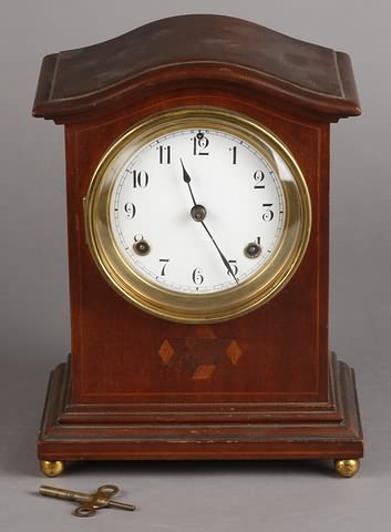 Appraisal: Circa mahogany inlaid case day time and strike movement porcelain