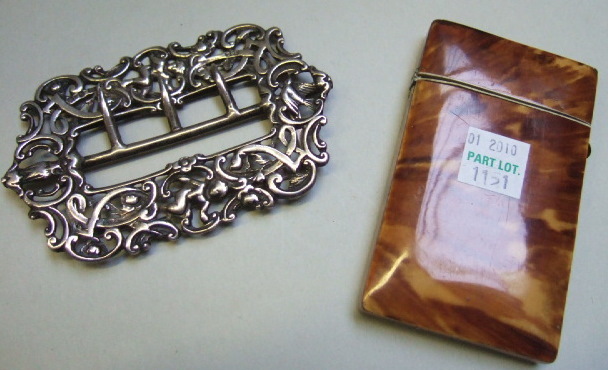 Appraisal: A Victorian silver waistbelt buckle cast and pierced with putti