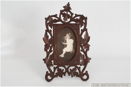 Appraisal: PHOTO OF YOUNG GIRL IN CARVED B F FRAME W