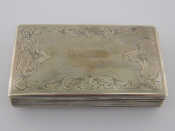 Appraisal: A Dutch silver box with reeded sides and engraving on