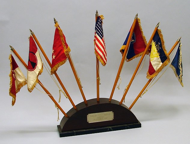 Appraisal: Half circle desk flag stand with plaque engraved General L