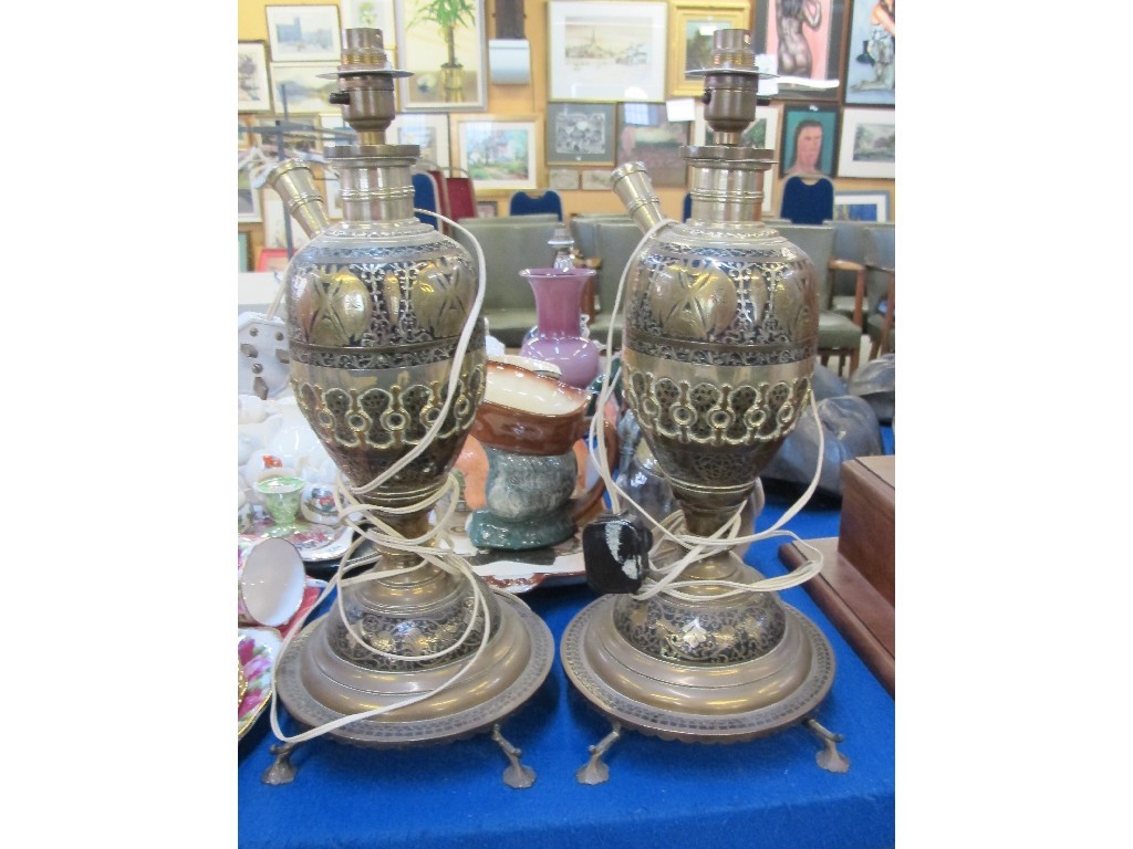 Appraisal: Pair of brass hookah pipe bases converted to lamps