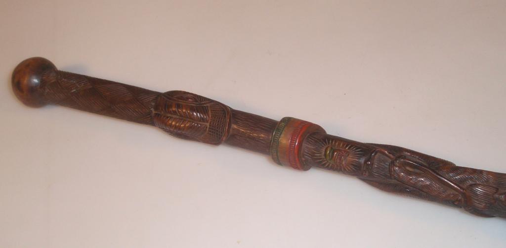 Appraisal: A thC South American walking stick carved with bird mask