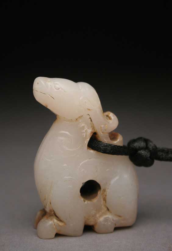 Appraisal: CARVED JADE TOGGLE Chinese carved white jade toggle in the