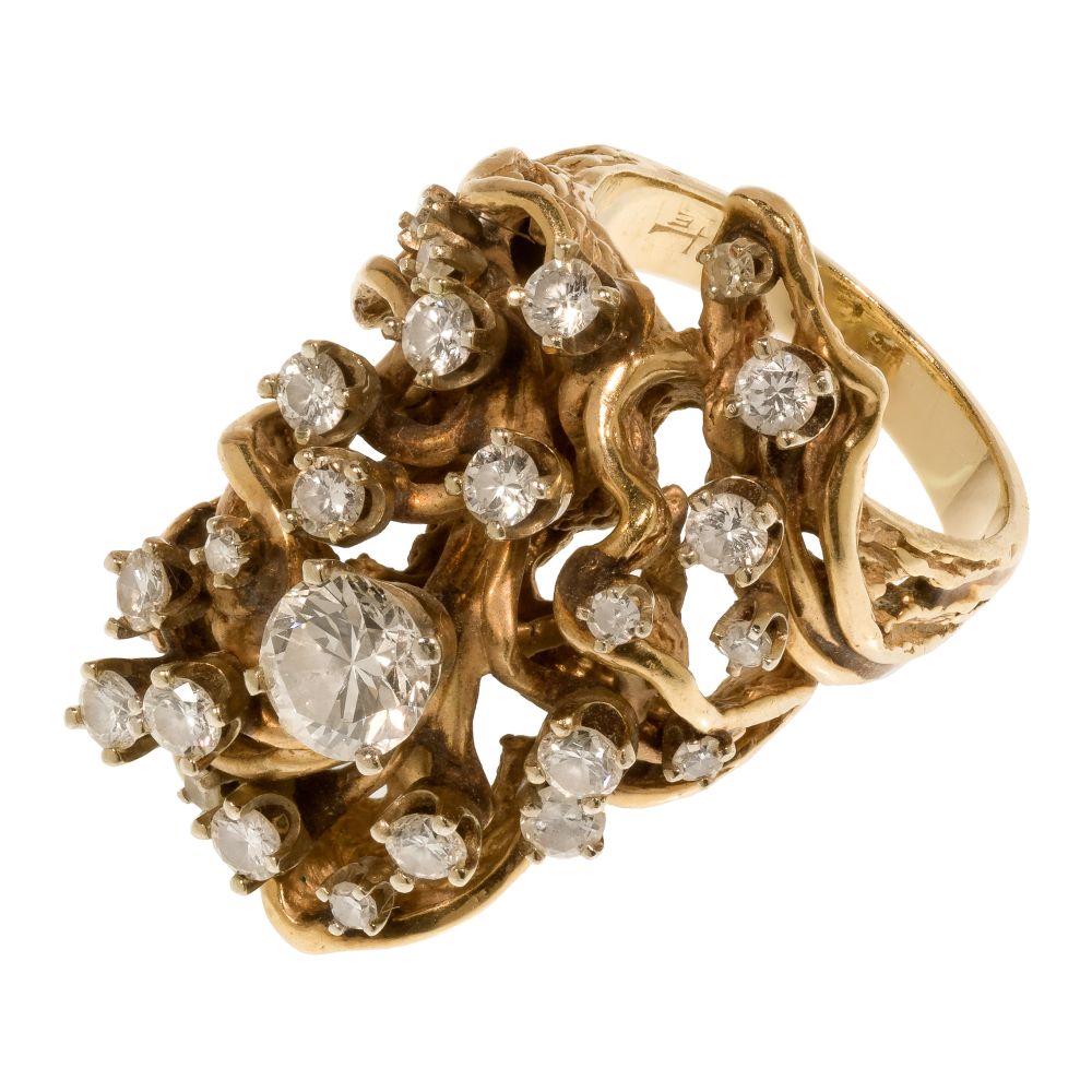 Appraisal: K YELLOW GOLD AND DIAMOND RINGStatement cluster ring shaped as