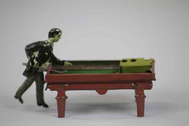 Appraisal: POOL PLAYER PENNY TOY Kellerman Germany c featuring a dapper