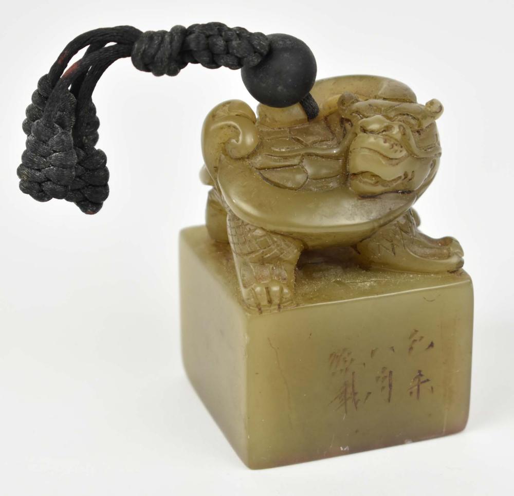 Appraisal: CHINESE CARVED SOAPSTONE SEAL th Century The brownish green square