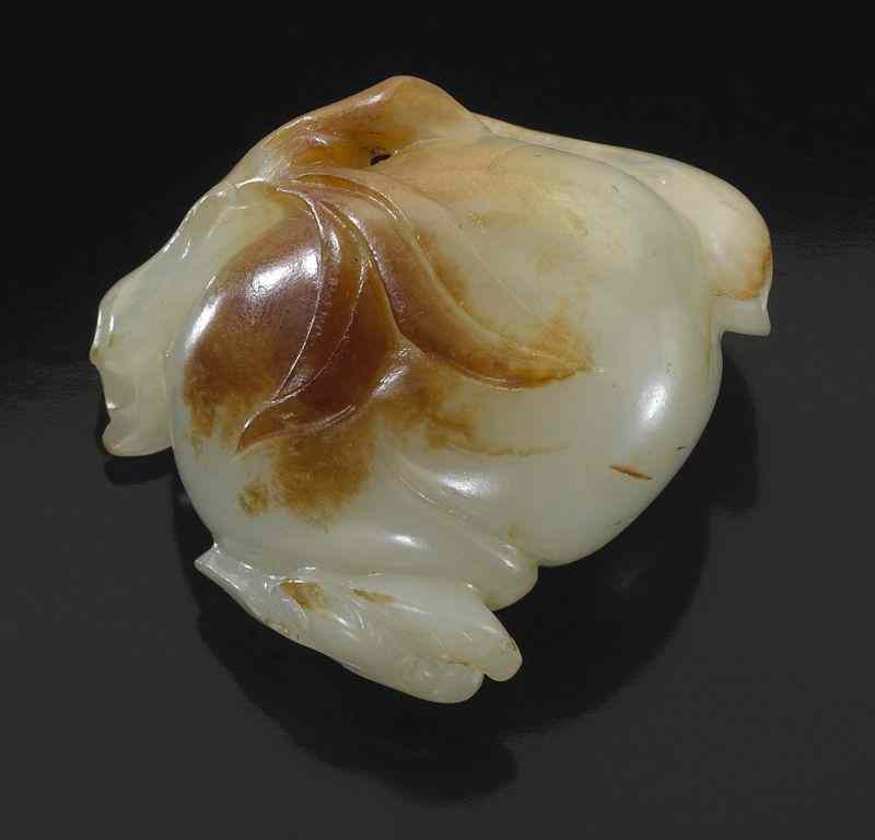 Appraisal: Chinese Qing carved white jade double peachwith russet skin ''H