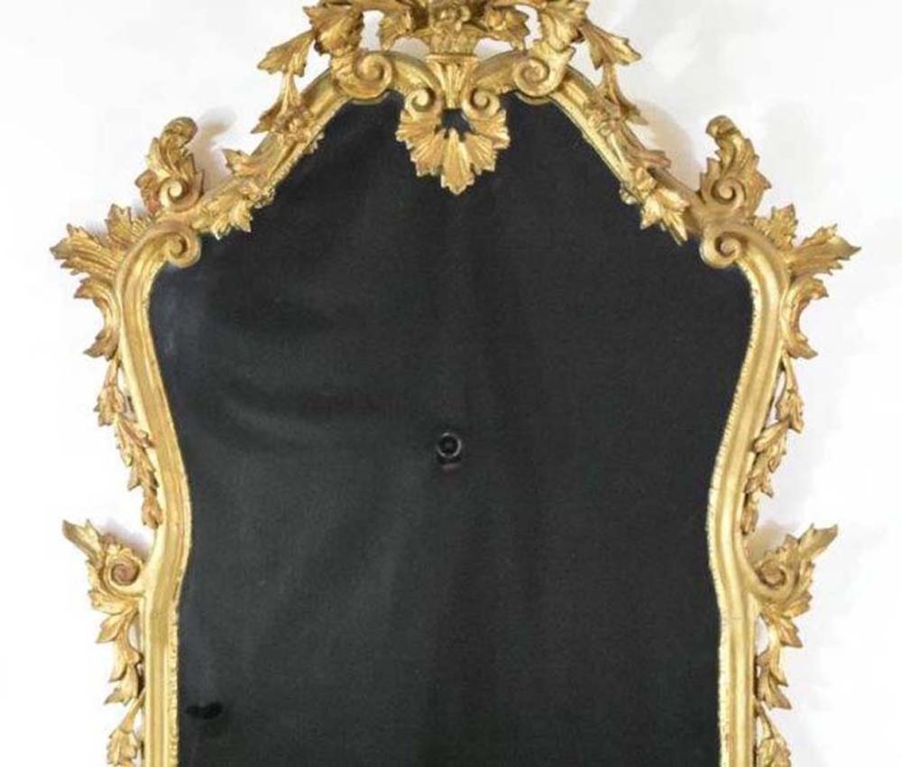 Appraisal: CONTINENTAL ROCOCO STYLE GILT WOOD MIRRORGerman Italian Circa The shaped