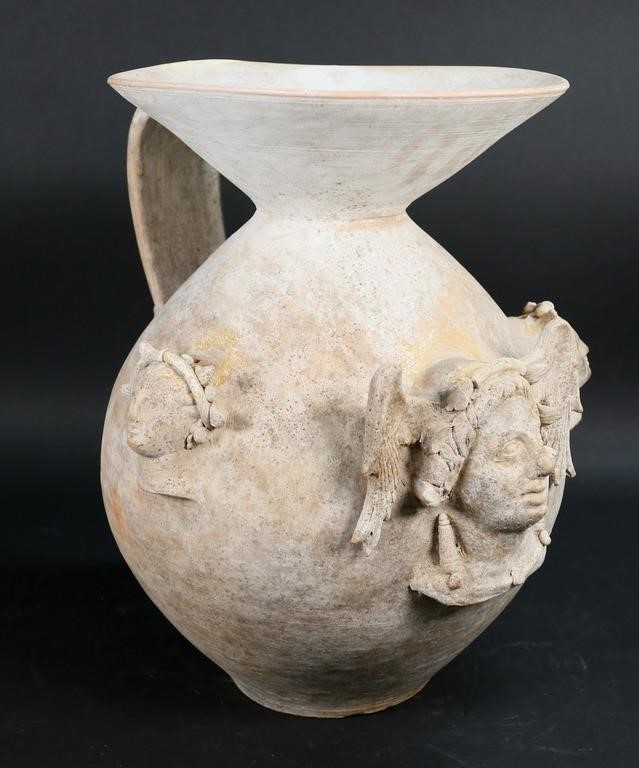 Appraisal: Figural terra cotta pottery vase with figures from Greek mythology