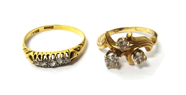 Appraisal: A gold and diamond set three stone ring claw set