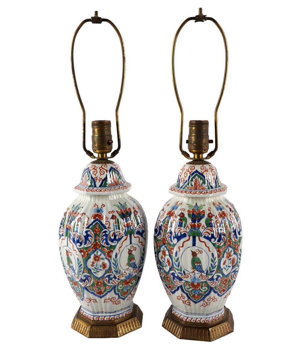 Appraisal: PAIR OF DELFT POTTERY JARSno visible marks mounted and electrified