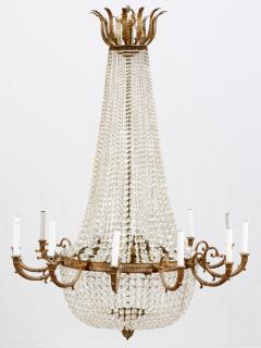 Appraisal: TWELVE-LIGHT BRONZE AND CRYSTAL CHANDELIER H DIA Having a bronze