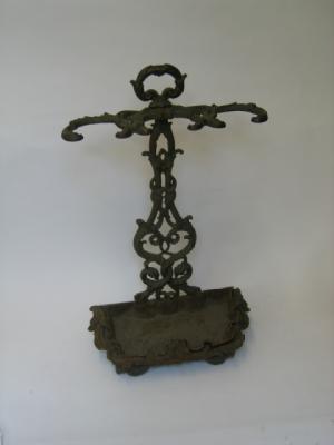 Appraisal: A VICTORIAN CAST IRON STICK STAND the vase shaped back